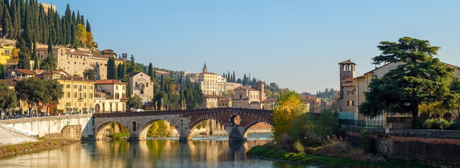 Verona Ponte Pietra with Historic Buildings and Adige River
